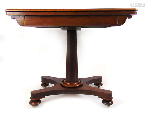 A 19th century mahogany tea table,