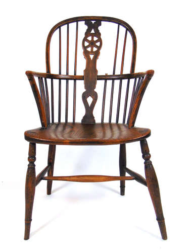 An early 19th century elm, beech and fruit wood Windsor chai...