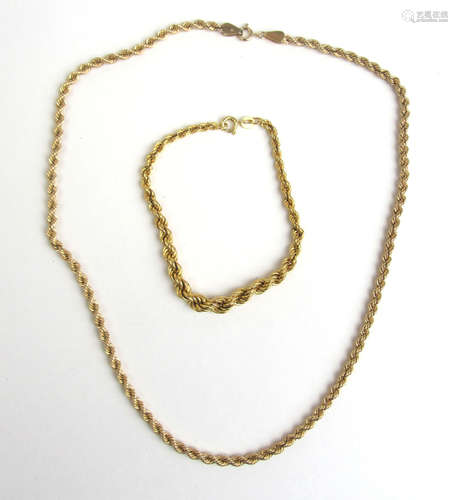 A 9ct gold rope twist necklace together with a 9ct gold rope...