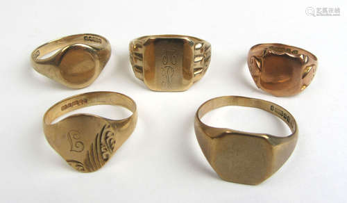 A collection of five 9ct gold signet rings. Approx weight 21...