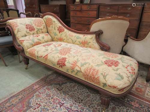 A Victorian mahogany chaise lounge upholstered in a Morris f...