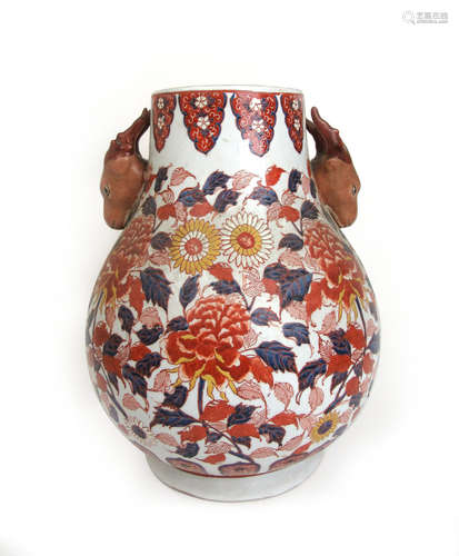 A 19th century Japanese imari vase, the body having floral d...