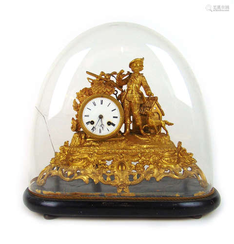 A late 19th century gilt metal mantle clock under broken gla...