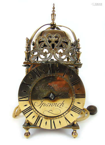 A 19th century brass lantern clock in the 17th century style...