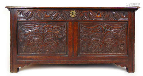 An 18th century oak coffer,