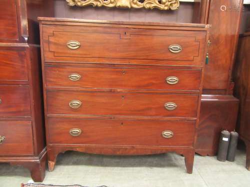 A late 18th century mahogany and ebony strung secretaire che...