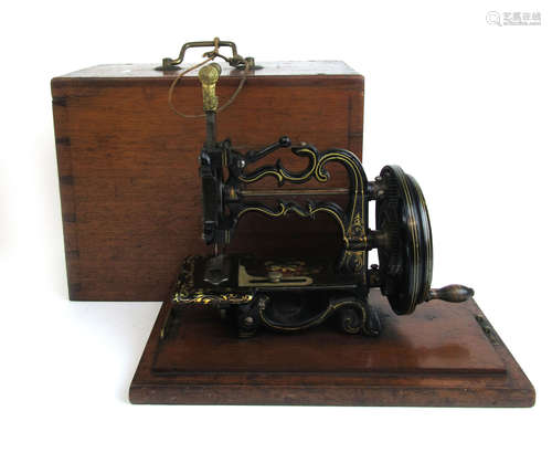 A Victorian hand crank sewing machine by James Weir,