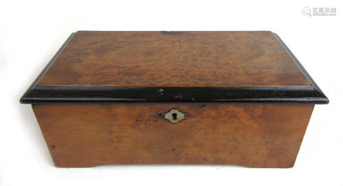 A 19th century burr walnut cased cylinder music box bearing ...