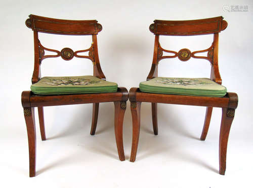 A pair of early 19th century rosewood and brass mounted chai...