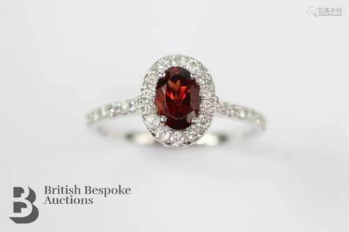 An 18ct White Gold Garnet & Diamond Ring