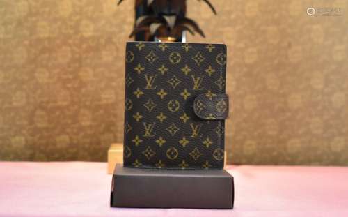 LOUIS VUITTON. Mini carnet de note et répertoire téléphoniqu...