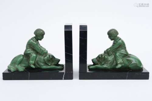 MARTEL (sculp.) paire Art Deco-boekensteunen telkens met een...