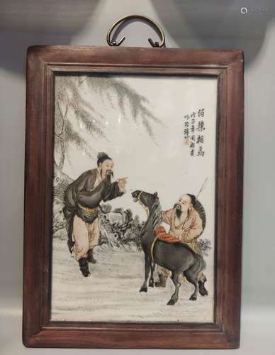 A PORCELAIN WALL PLAQUE