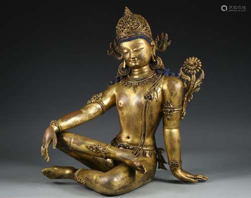 A GILT-BRONZE FIGURE OF GUANYIN