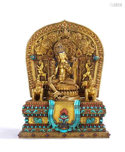 A GEM'S INLAID GILT-BRONZE TARA