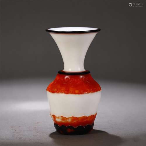 A RED OVERLAY WHITE GLASS VASE