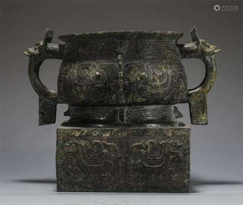 A BRONZE FOOD VESSEL