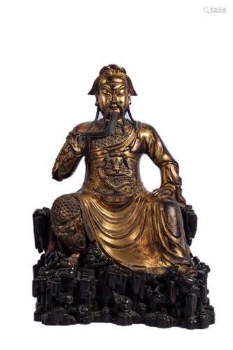 A GILT-BRONZE FIGURE OF GUANDI