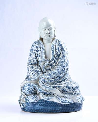 A BLUE AND WHITE FIGURE OF LUOHAN