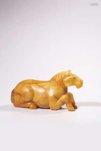 A CARVED YELLOW JADE HORSE