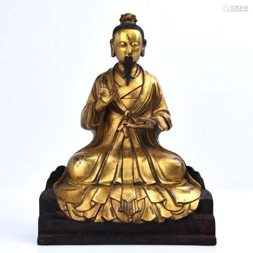 A GILT-BRONZE FIGURE OF TAO