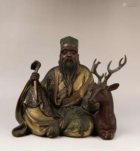 A GILT-BRONZE FIGURE OF SHOUXIN