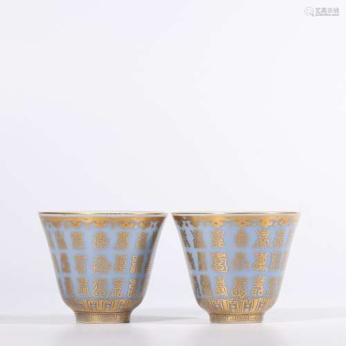 A PAIR OF BLUE-GROUND GILT-DECORATED CUPS.MARK OF