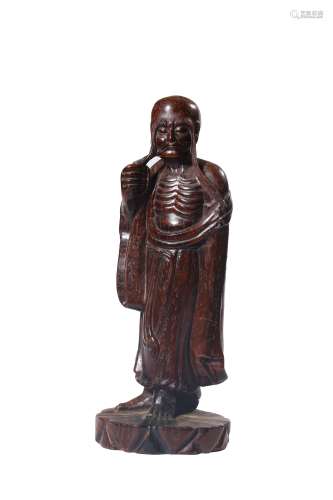 A CARVED ZITAN LOUHAN.QING PERIOD