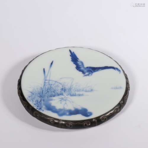 A BLUE AND WHITE TEAPOT STAND.MARK OF WUBU
