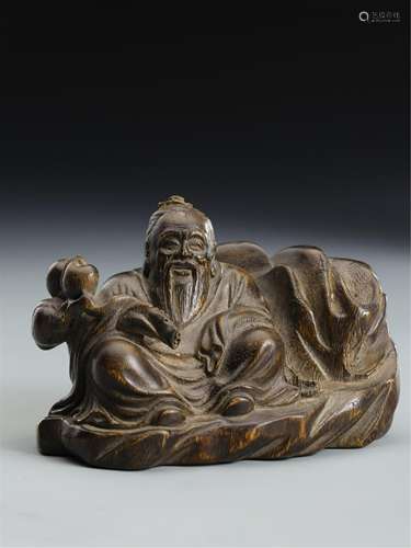 A CHINESE AGARWOOD FIGURE OF BUDDHA SEATED STATUE