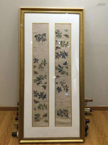 A FRAMED HANGING SCREEN OF TWO EMBROIDERIES