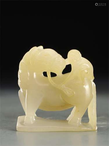 A CHINESE WHITE JADE HORSE AND MONKEY HAND PIECES