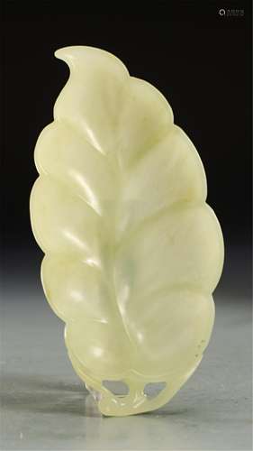 A CHINESE WHITE JADE LEAF SHAPED WASHER