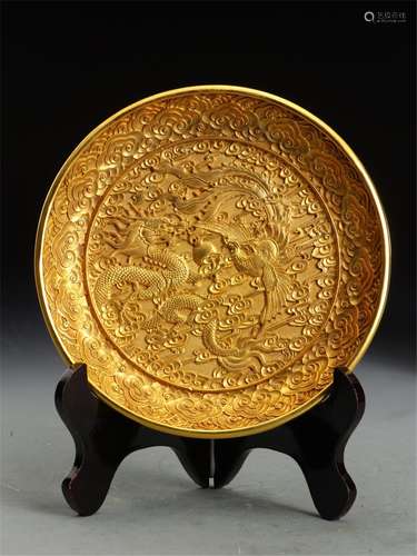 A CHINESE GILT BRONZE DRAGON PHOENIX PLATE