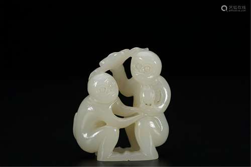 A CHINESE WHITE JADE TEO MONKEYS HAND PIECES