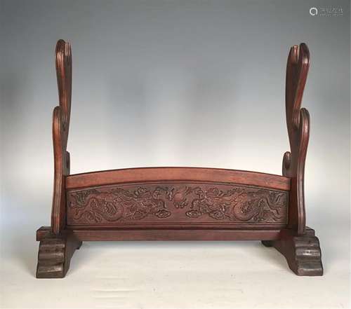 A CARVED DRAGONS HARDWOOD BROADSWORD STAND