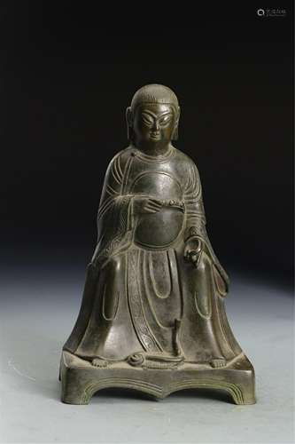 A CHINESE FIGURE OF BUDDHA SEATED STATUE