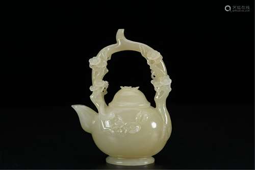 A CHINESE WHITE JADE LONG HANDLE EWER