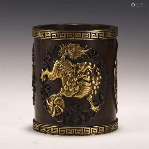 A CHINESE GILT BRONZE BEAST PATTERN BRUSH POT