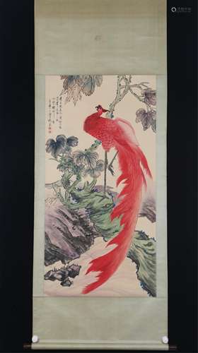 A SCROLL PAINTING OF RED PEACOCK