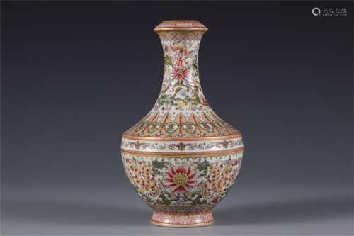 A CHINESE ENAMEL FLOWER PORCELAIN VASE