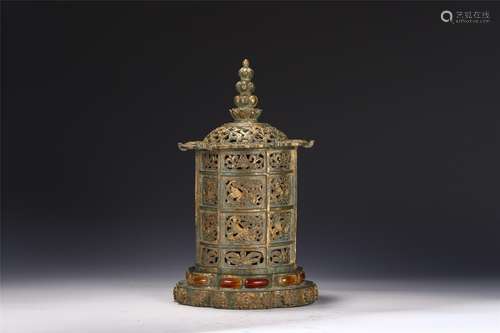 A CHINESE GILT BRONZE BEAST PATTERN TOWER