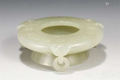 A CHINESE DRAGON PATTERB JADE WASHER