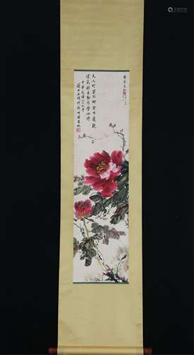 A SCROLL PAINTING OF FLOWERS BLOOM AND WEALTH