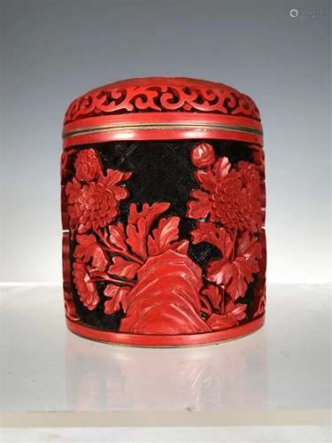 A CARVED LACQUER FLORAL TEA-LEAF JAR AND COVER