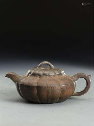 A CHINESE ZISHA STONE TEAPOT