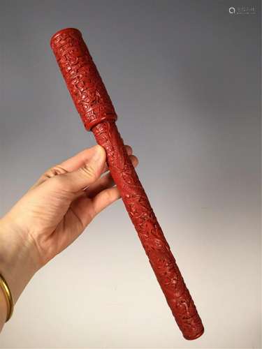 A CARVED RED LACQUER DRAGONS WRITING BRUSH