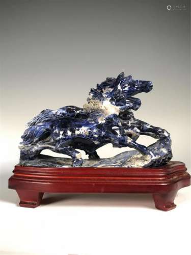 A LAPIS LAZULI CARVED DECORATION OF GALLOPING HORSES