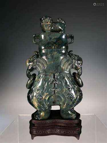 A JADE CARVED VASE WITH COVER AND BEAST HANDLES