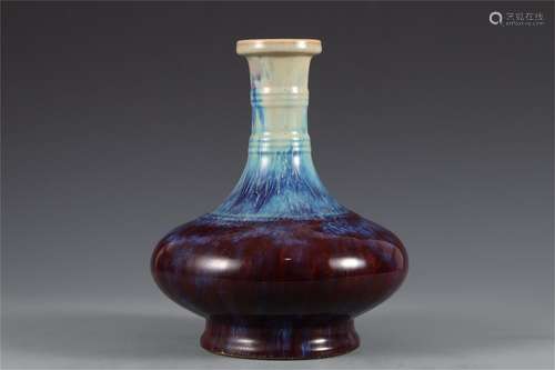 A CHINESE FLAMBE GLAZED PORCELAIN VASE